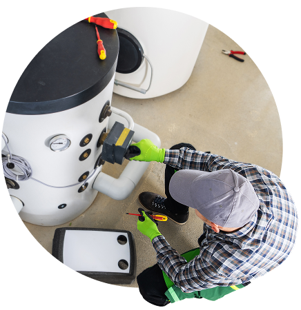 Technician servicing water heater